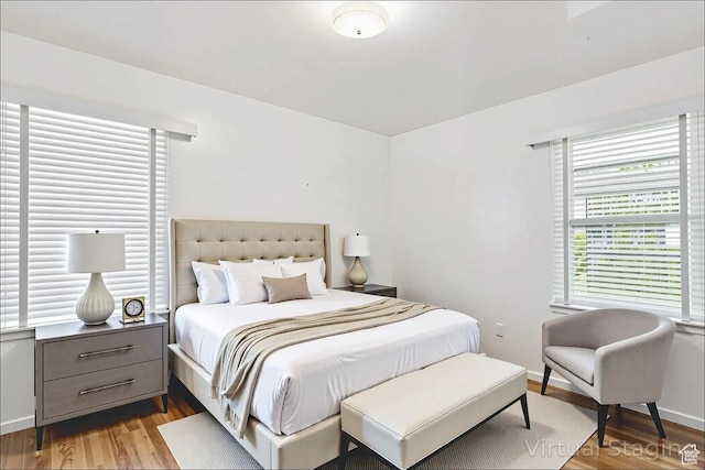 3622 Jackson Ave, Ogden, UT 84403 - bedroom with wood finished floors