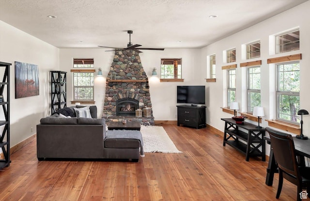 8817 E Mountain Valley Dr S, Huntsville, UT 84317 - living area featuring ceiling fan, light wood-style floors, a fireplace, and recessed lighting
