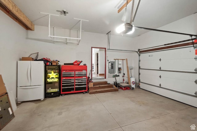 8817 E Mountain Valley Dr S, Huntsville, UT 84317 - garage featuring freestanding refrigerator and electric panel