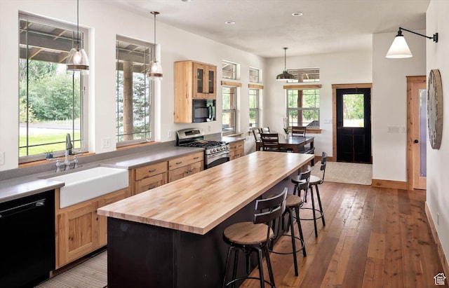 8817 E Mountain Valley Dr S, Huntsville, UT 84317 - kitchen featuring black appliances, wooden counters, light brown cabinets, light wood-style flooring, and recessed lighting