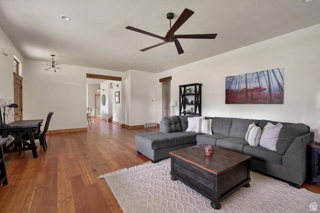 8817 E Mountain Valley Dr S, Huntsville, UT 84317 - living area featuring ceiling fan, wood finished floors, and a chandelier