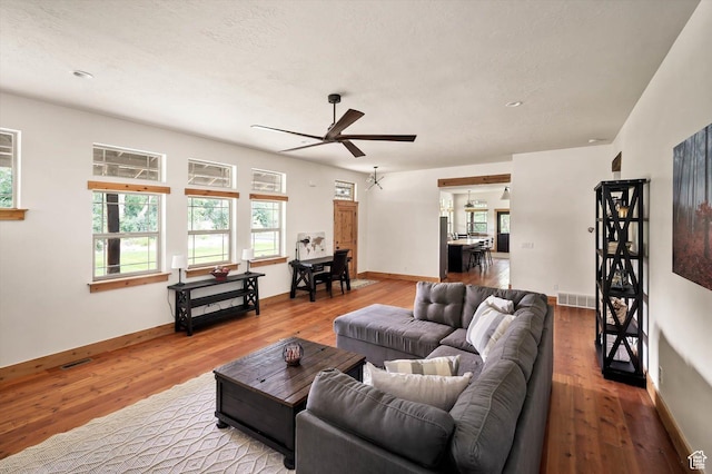 8817 E Mountain Valley Dr S, Huntsville, UT 84317 - living room featuring a ceiling fan and wood finished floors