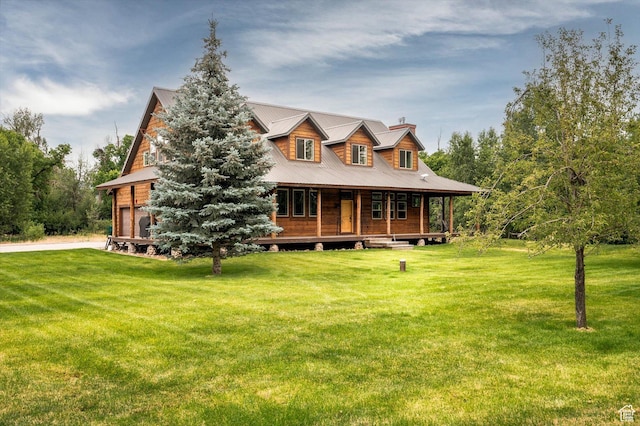 8817 E Mountain Valley Dr S, Huntsville, UT 84317 - log home with covered porch, a front yard, and a metal roof