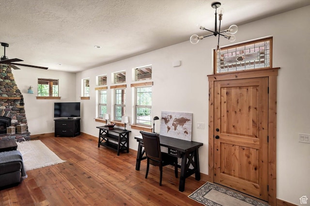 8817 E Mountain Valley Dr S, Huntsville, UT 84317 - foyer with hardwood / wood-style flooring, a chandelier, ceiling fan, and a textured ceiling