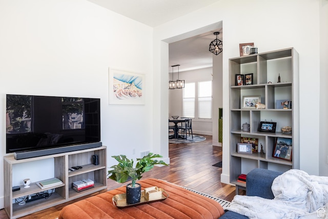 334 N C St, Salt Lake City, UT 84103 - living room with wood finished floors and a chandelier