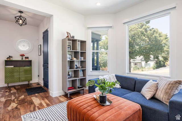 334 N C St, Salt Lake City, UT 84103 - living room featuring wood finished floors and baseboards