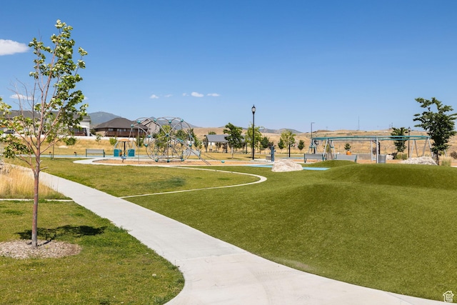 6523 W Bridge Maple Ln S, West Jordan, UT 84081 - view of property's community with a lawn