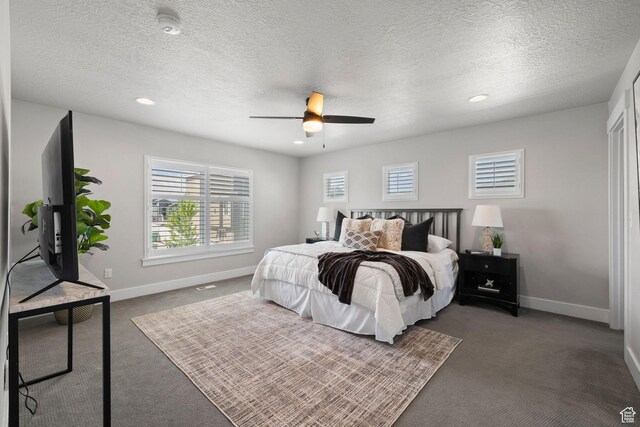 6523 W Bridge Maple Ln S, West Jordan, UT 84081 - bedroom featuring dark carpet, recessed lighting, a textured ceiling, and ceiling fan