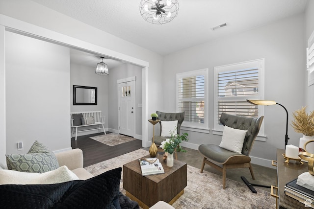 6523 W Bridge Maple Ln S, West Jordan, UT 84081 - living area featuring a chandelier and wood finished floors