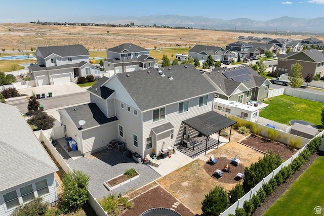 6523 W Bridge Maple Ln S, West Jordan, UT 84081 - aerial view of residential area featuring a mountainous background