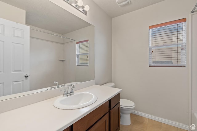 2794 W Harker Ridge Cv, Salt Lake City, UT 84129 - full bathroom featuring vanity, tile patterned flooring, and a shower