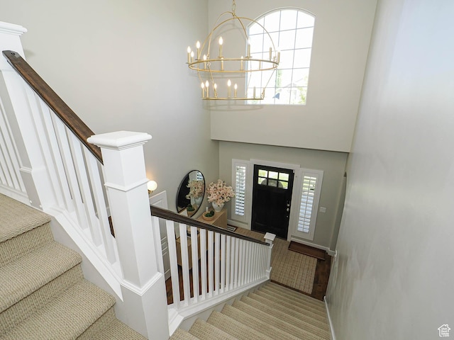 618 E Beaumont Way S, Draper, UT 84020 - entryway featuring a chandelier, stairway, and a towering ceiling