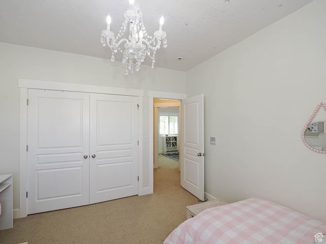618 E Beaumont Way S, Draper, UT 84020 - bedroom featuring light carpet, a chandelier, and a closet