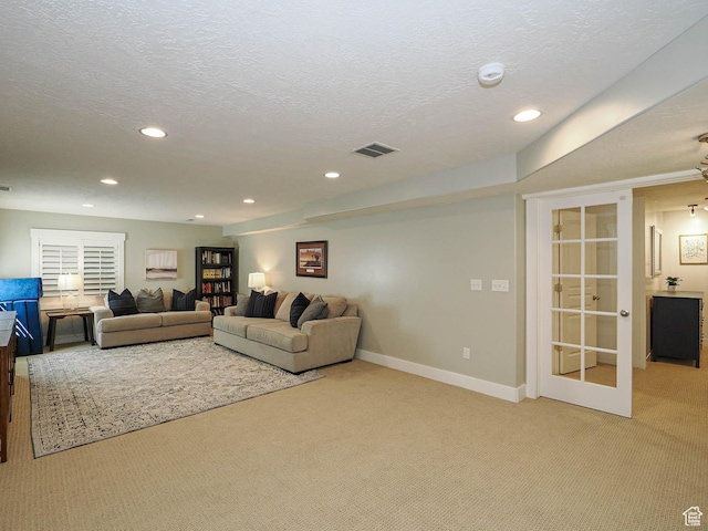 618 E Beaumont Way S, Draper, UT 84020 - carpeted living room with recessed lighting, a textured ceiling, and french doors