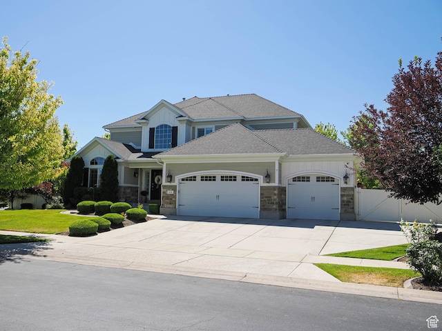 618 E Beaumont Way S, Draper, UT 84020 - craftsman-style house featuring a garage, stone siding, and concrete driveway