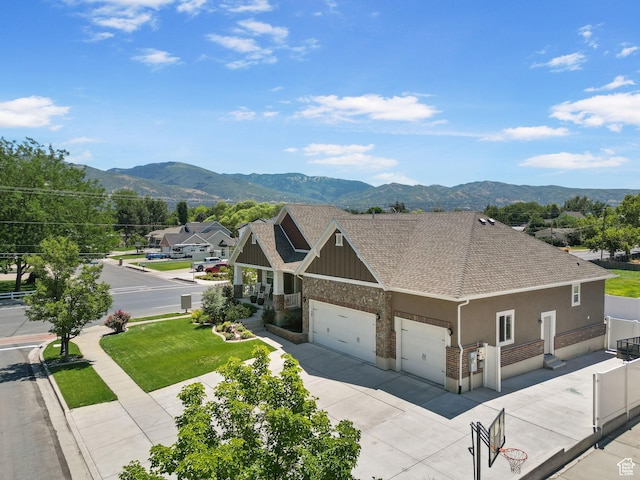809 W 1320 N, West Bountiful, UT 84087 - view of front of home with a mountain view, driveway, a shingled roof, and an attached garage