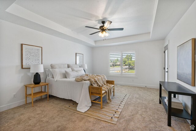 809 W 1320 N, West Bountiful, UT 84087 - bedroom featuring a raised ceiling, light colored carpet, and a ceiling fan