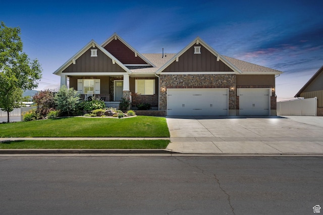 809 W 1320 N, West Bountiful, UT 84087 - craftsman-style home with an attached garage, concrete driveway, board and batten siding, and a porch