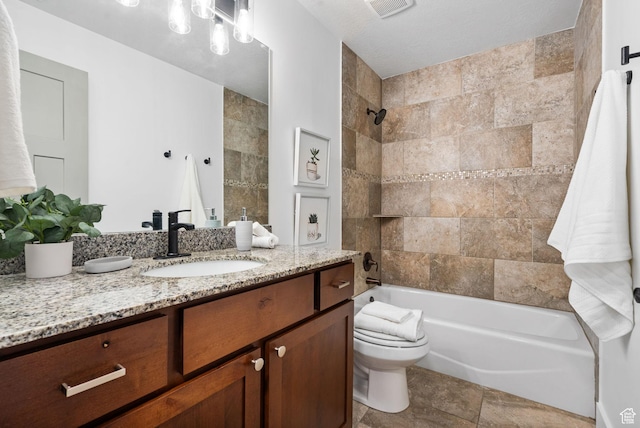 809 W 1320 N, West Bountiful, UT 84087 - bathroom featuring vanity, washtub / shower combination, and stone finish floors