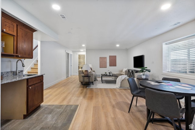 809 W 1320 N, West Bountiful, UT 84087 - dining room featuring recessed lighting, light wood finished floors, and stairs