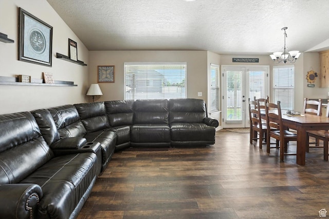 758 N 400 E, Tremonton, UT 84337 - living room with a chandelier, wood-type flooring, and a textured ceiling