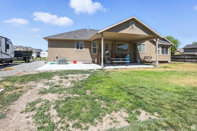 758 N 400 E, Tremonton, UT 84337 - back of property with stucco siding and a patio