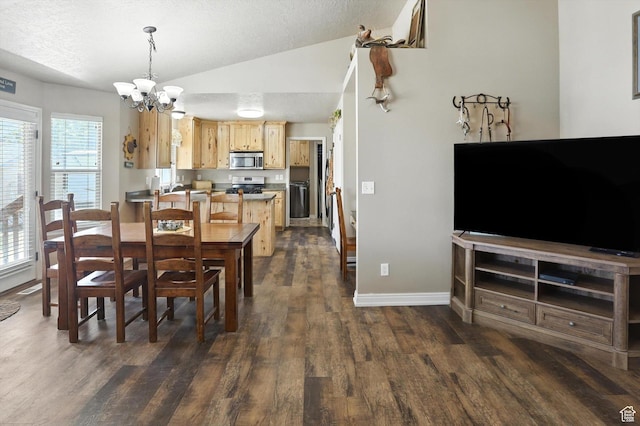 758 N 400 E, Tremonton, UT 84337 - dining space with lofted ceiling, a chandelier, dark wood finished floors, and a textured ceiling