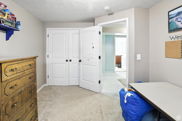 758 N 400 E, Tremonton, UT 84337 - bedroom with a textured ceiling, light carpet, and a closet