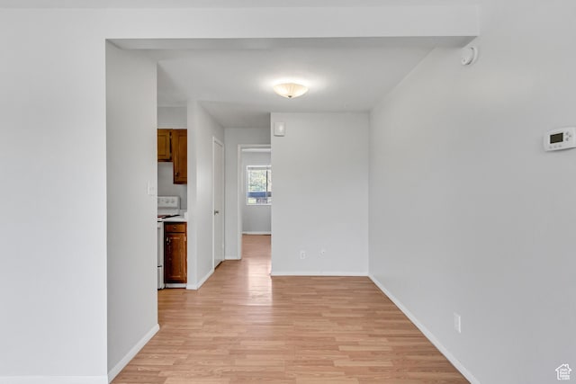 1030 Healy St Unit 2, Ogden, UT 84403 - spare room featuring light wood-style flooring and a smoke detector