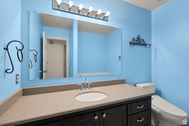 1657 E 1500 N, Logan, UT 84341 - half bath featuring vanity and toilet