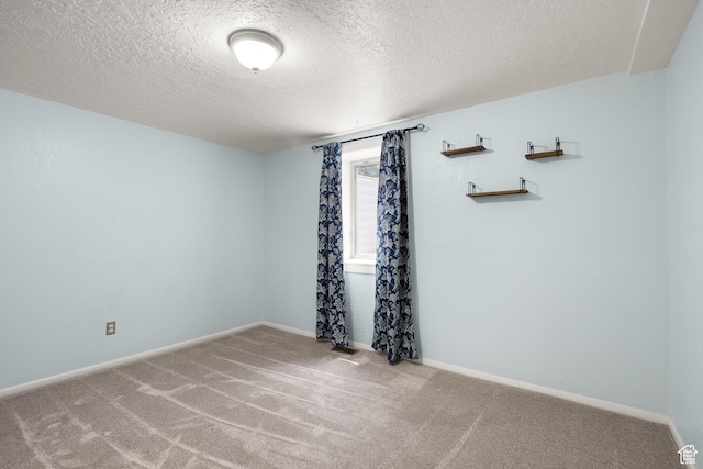 1657 E 1500 N, Logan, UT 84341 - carpeted empty room with a textured ceiling and baseboards