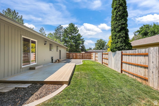 1657 E 1500 N, Logan, UT 84341 - fenced backyard featuring a deck
