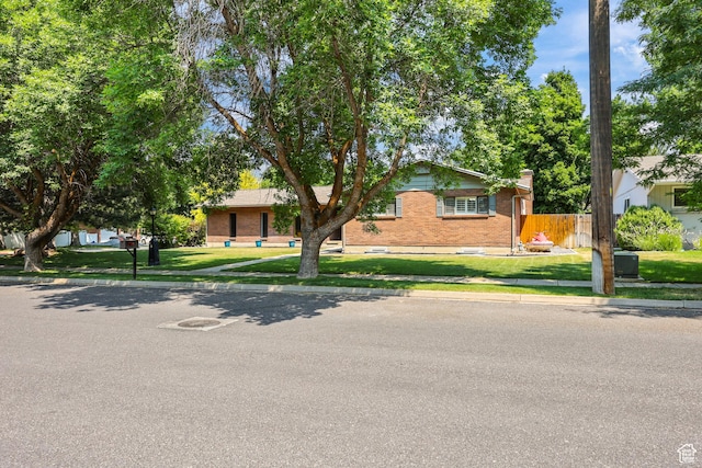 1657 E 1500 N, Logan, UT 84341 - view of front of property featuring brick siding and a chimney