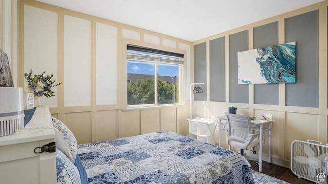 3417 S Kenna Ln Unit 1, West Haven, UT 84401 - bedroom with a decorative wall and dark wood finished floors