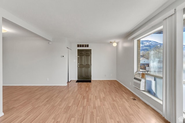 1050 Healy St Unit 1, Ogden, UT 84403 - unfurnished room with light wood-style flooring and cooling unit