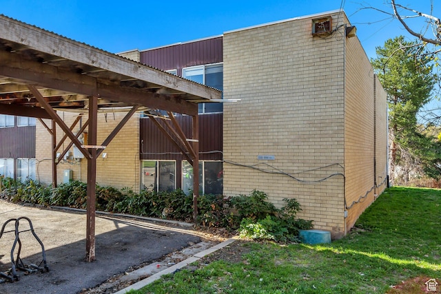 1050 Healy St Unit 1, Ogden, UT 84403 - doorway to property featuring brick siding and a yard