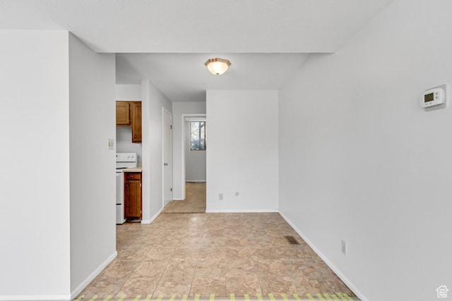 1050 Healy St Unit 1, Ogden, UT 84403 - empty room featuring baseboards and stone finish floors