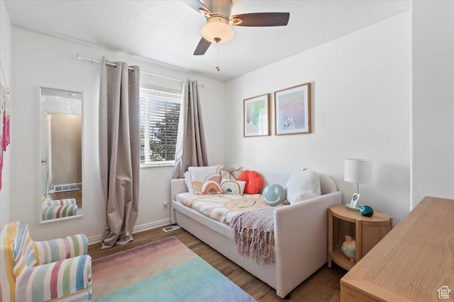 573 E Compass Cir S, North Salt Lake, UT 84054 - bedroom featuring wood finished floors and a ceiling fan
