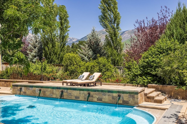 897 W Pfeifferhorn Dr, Alpine, UT 84004 - view of swimming pool with a mountain view and a patio area