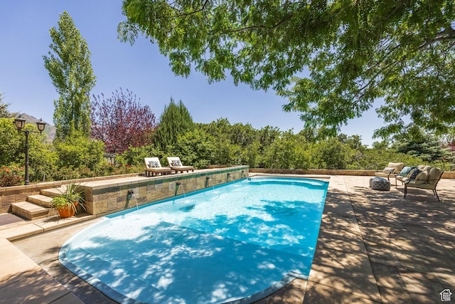 897 W Pfeifferhorn Dr, Alpine, UT 84004 - outdoor pool featuring a patio and an outdoor fire pit