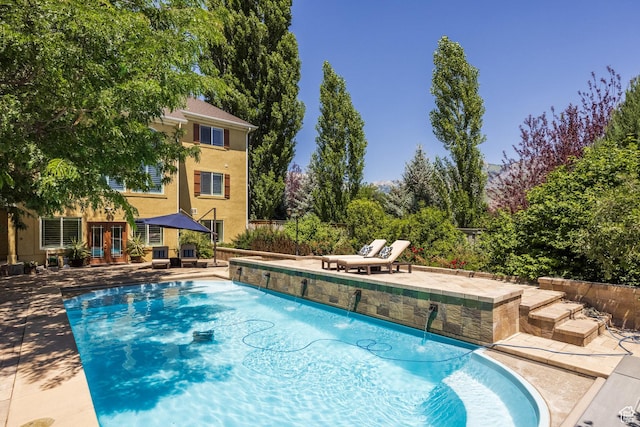 897 W Pfeifferhorn Dr, Alpine, UT 84004 - swimming pool featuring french doors and a patio area