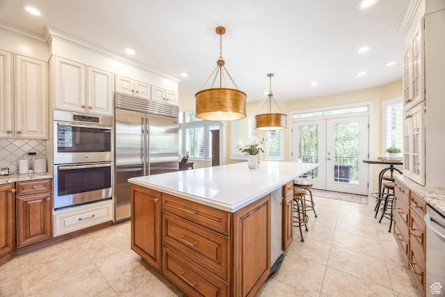 897 W Pfeifferhorn Dr, Alpine, UT 84004 - kitchen with stainless steel appliances, french doors, plenty of natural light, backsplash, and recessed lighting