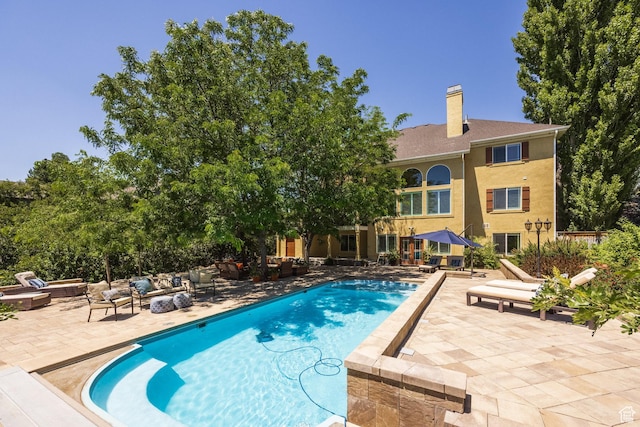 897 W Pfeifferhorn Dr, Alpine, UT 84004 - swimming pool featuring an outdoor living space and a patio area
