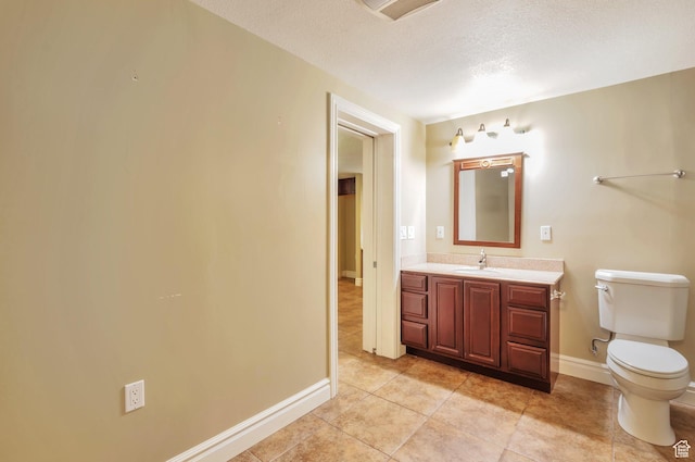 483 W 3500 N, Pleasant View, UT 84414 - bathroom featuring vanity, tile patterned floors, and a textured ceiling