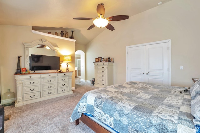 483 W 3500 N, Pleasant View, UT 84414 - bedroom with arched walkways, carpet floors, a closet, a ceiling fan, and lofted ceiling