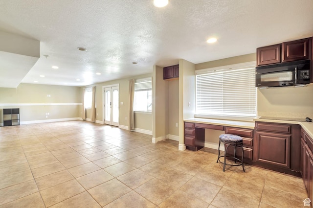 483 W 3500 N, Pleasant View, UT 84414 - kitchen featuring black appliances, light countertops, recessed lighting, light tile patterned floors, and a textured ceiling