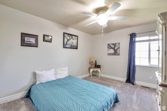 483 W 3500 N, Pleasant View, UT 84414 - carpeted bedroom featuring baseboards and a ceiling fan
