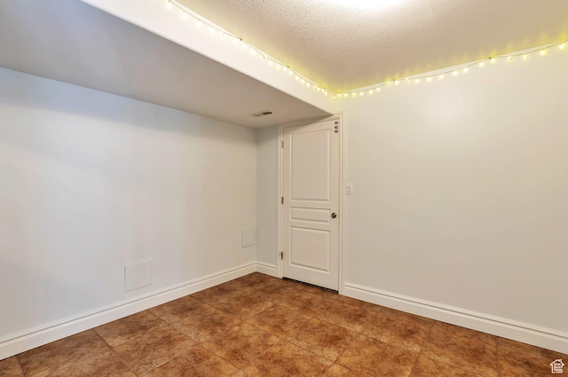 483 W 3500 N, Pleasant View, UT 84414 - unfurnished room with baseboards and a textured ceiling