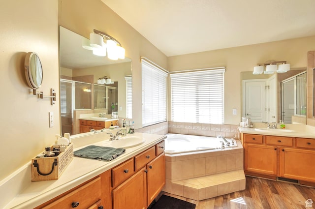 483 W 3500 N, Pleasant View, UT 84414 - full bath with a stall shower, two vanities, a bath, and wood finished floors