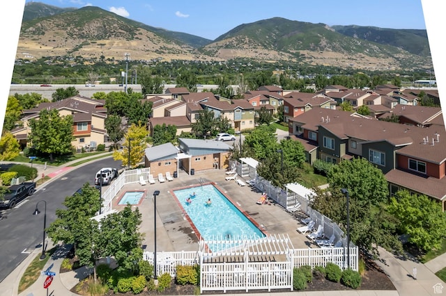1012 W Willow Wind Dr, Farmington, UT 84025 - aerial view of residential area featuring a mountain backdrop and a pool